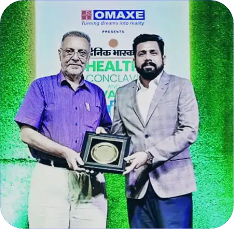 Nikhil Aggarwal, CEO of & Founder Ernst Pharmacia Awarded by Dr. Balbir Singh, Minister of Health and Family Welfare of Punjab​​