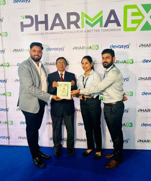 Ernst Pharmacia Team receiving excellence award at Pharma Ex Exhibition event